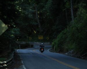 Motorcyclist riding down WA road